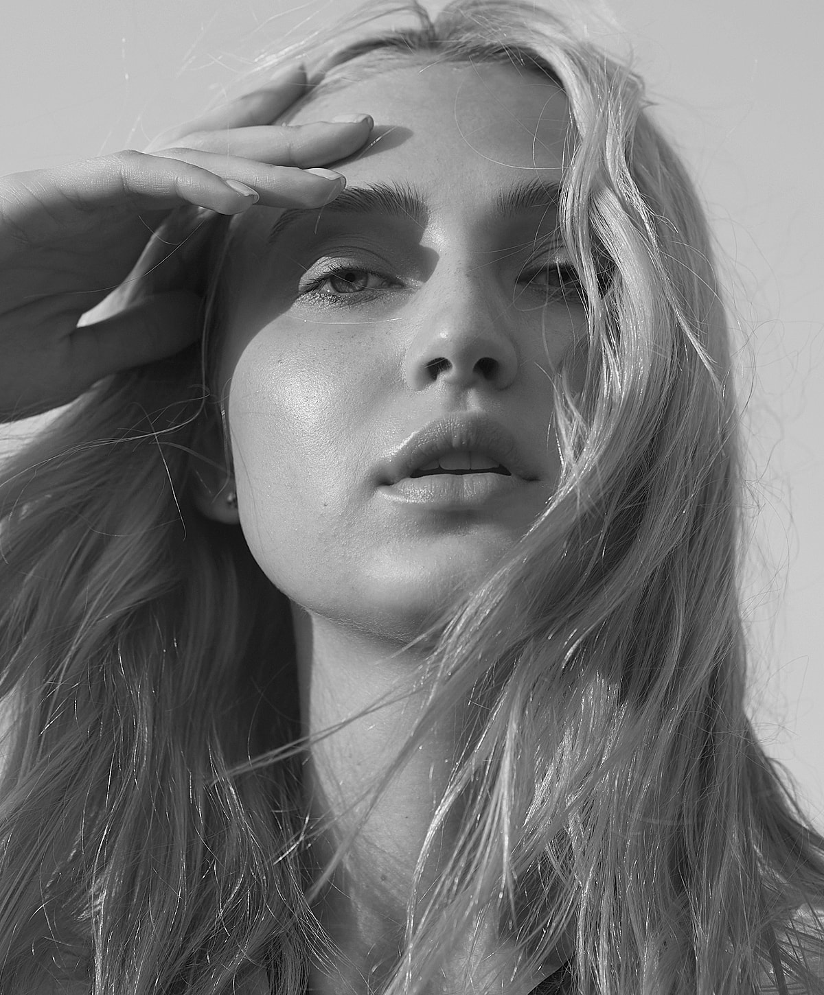 Black and white portrait of a woman with long hair