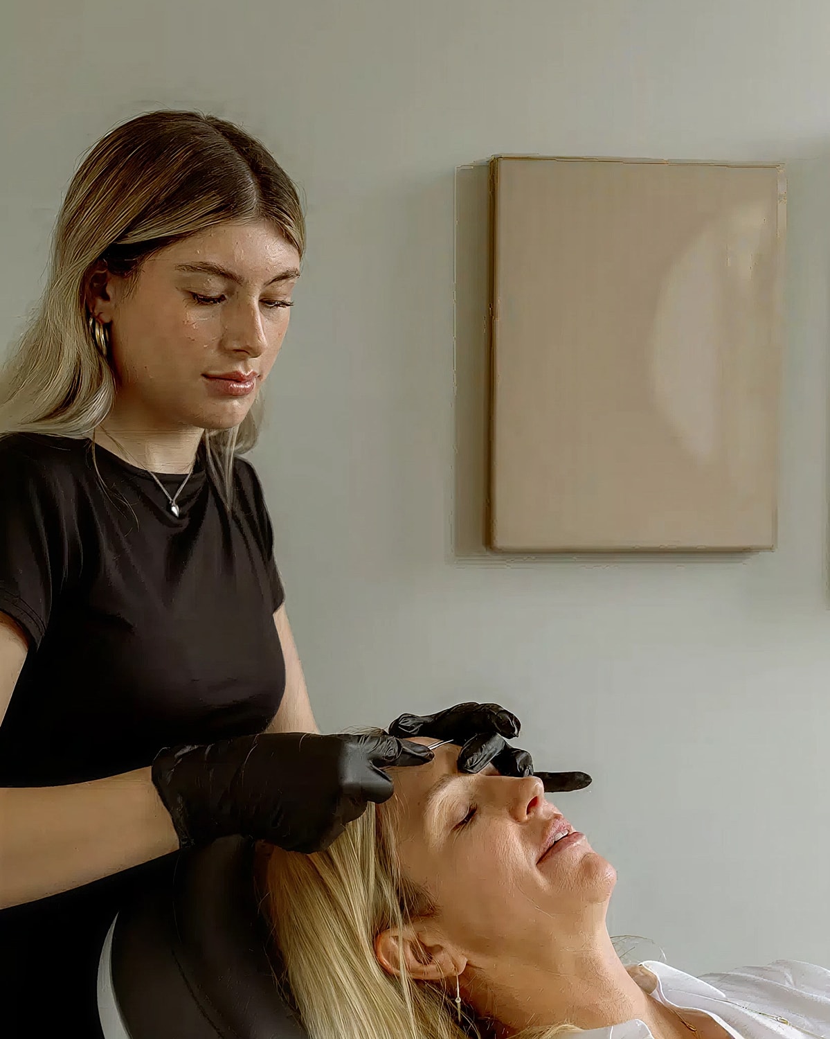 Beauty treatment in progress at a salon.