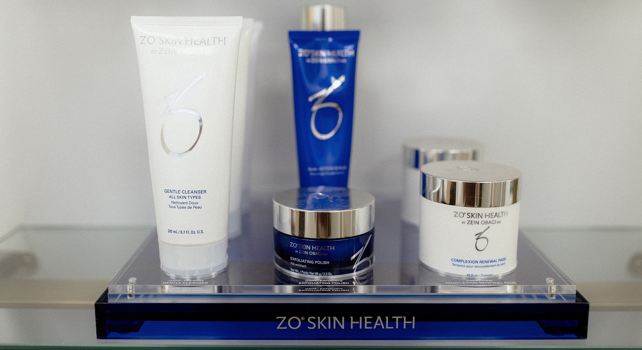ZO Skin Health skincare products arranged on shelf.